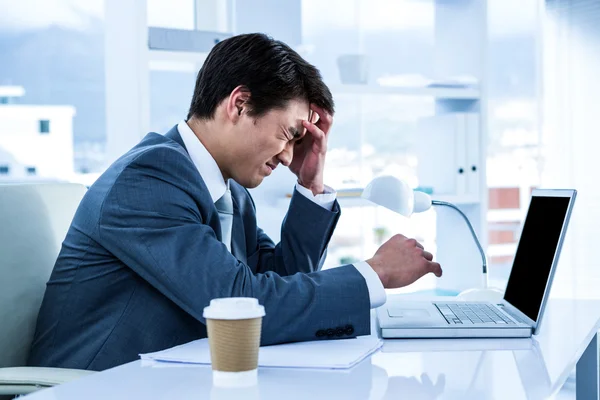 Businessman having a headache — Stock Photo, Image