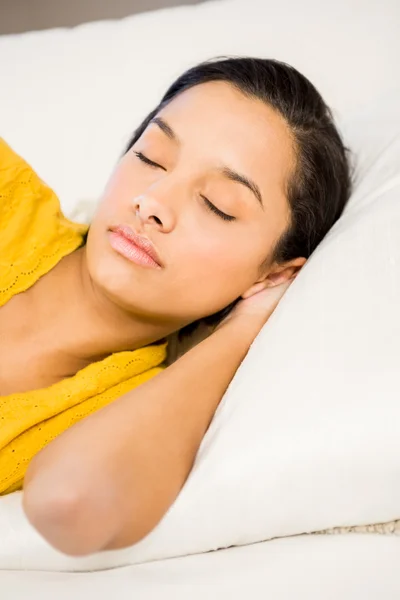 Sleeping brunette on the sofa — Stock Photo, Image