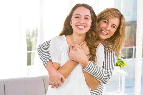 Smiling mother and daughter — Stock Photo, Image