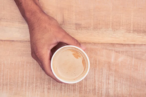 Coupé main tenant tasse de café — Photo