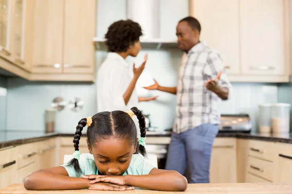 Sad girl against parents arguing — Stock Photo, Image