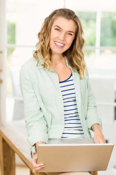 Woman holding a laptop — Stock Photo, Image