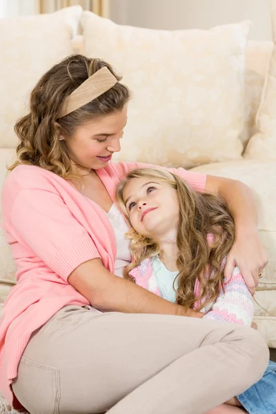 Mother and daughter smiling together — Stock Photo, Image