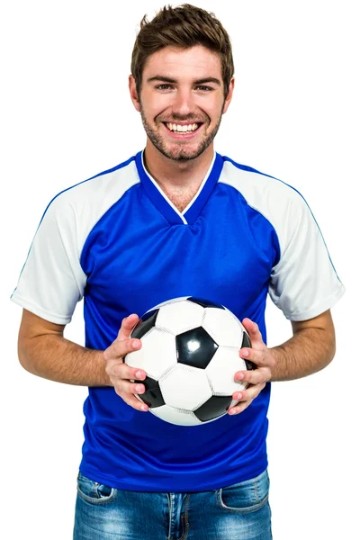 Porträt eines glücklichen Mannes mit Fußball — Stockfoto