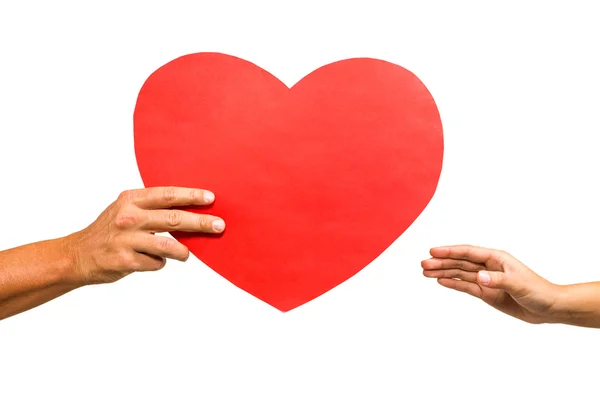 Hombre dando corazón en forma de papel a la mujer — Foto de Stock