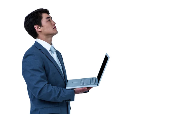 Businessman look away with his computer — Stock Photo, Image