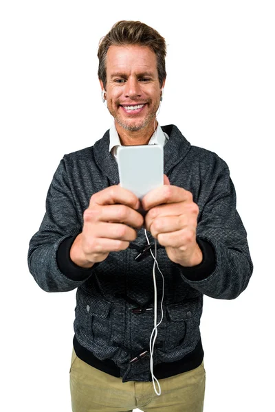 Homem feliz ouvindo música — Fotografia de Stock