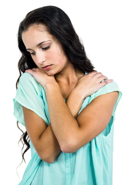 A Sad woman holding herself — Stock Photo, Image