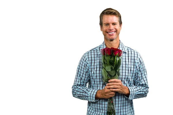 Glimlachende man die boeket rozen — Stockfoto