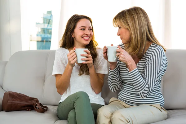 Mother and daughter drinking tea — Stock Photo, Image