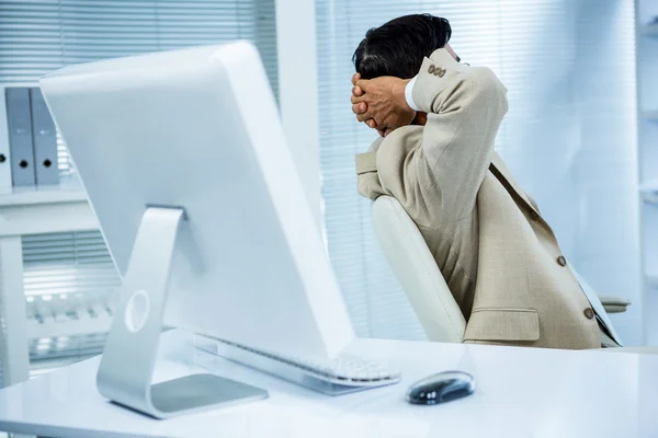 Relaxed businessman in his office — Stock Photo, Image