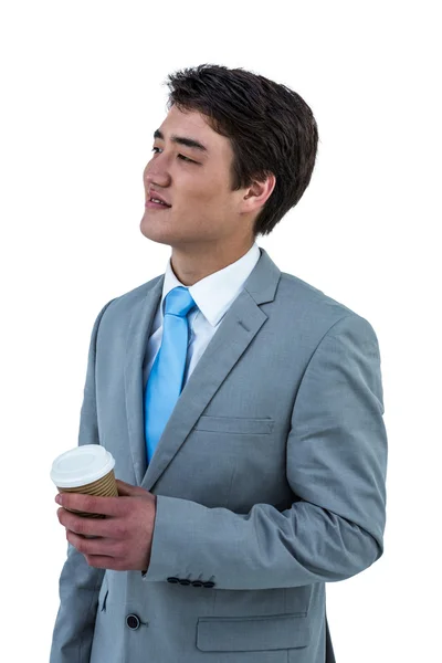 Asian businessman drinking coffee — Stock Photo, Image