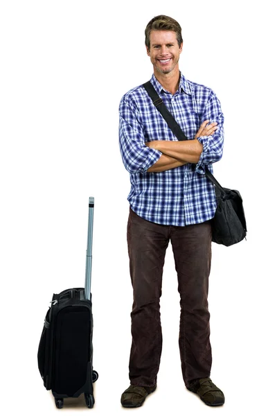 Portrait of smiling man with luggage — Stock Photo, Image