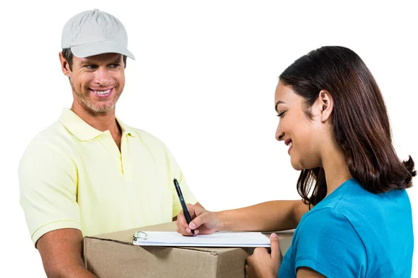 Cheerful delivery man with customer — Stock Photo, Image