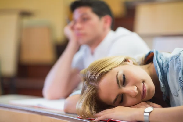 Female student falling asleep during class — Stock Photo, Image