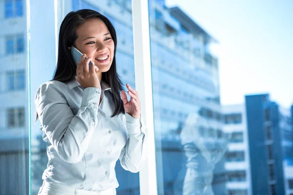 Smiling businesswoman on phone call — Stock Photo, Image