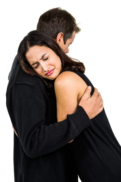 Unhappy couple embracing — Stock Photo, Image