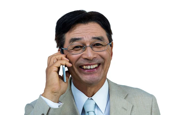 アジア系のビジネスマンの携帯電話通話を笑顔 — ストック写真
