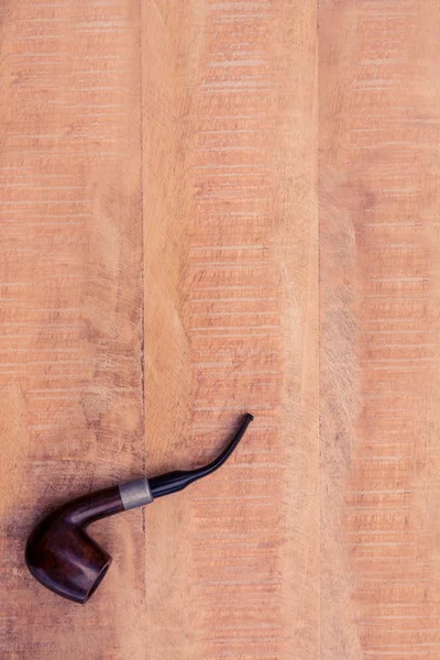 Rookpijp op tafel — Stockfoto