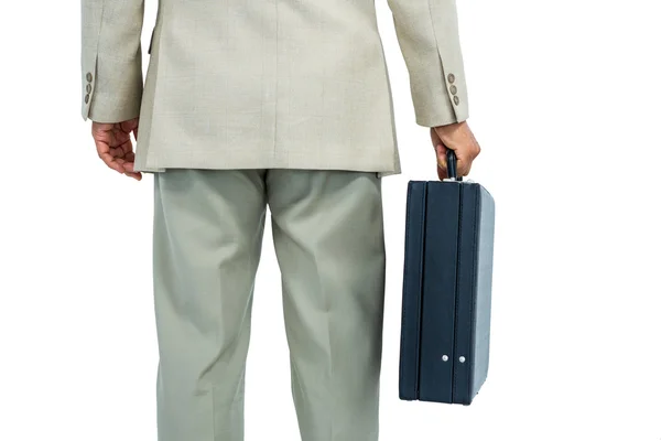 Businessman holding a briefcase — Stock Photo, Image