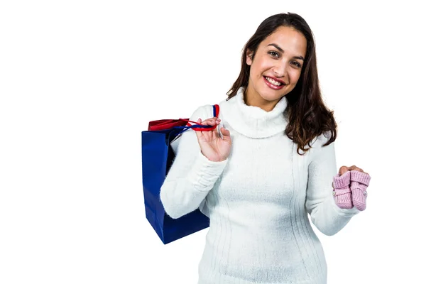 Šťastná mladá žena s nákupními taškami — Stock fotografie