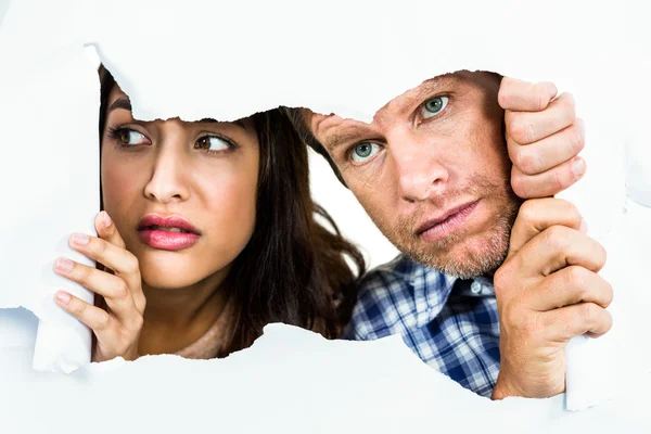 Fearful couple peeking — Stock Photo, Image