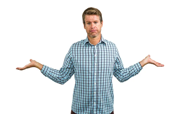 Casual man shrugging his shoulders — Stock Photo, Image