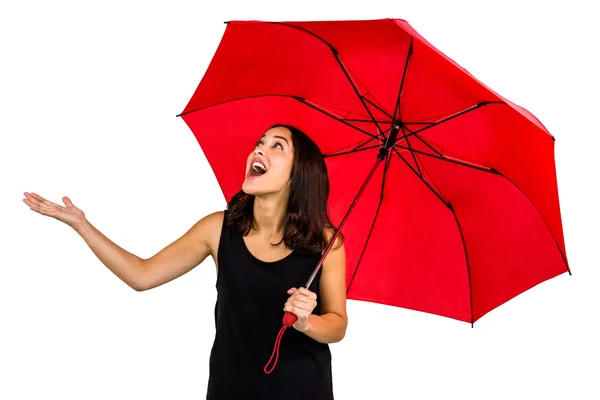 Shocked woman looking up Stock Photo