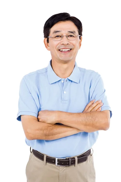 Portrait of happy man with arms crossed — Stock Photo, Image