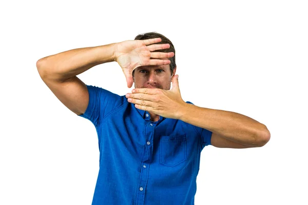 Portrait of man making frame with hands — Stock Photo, Image