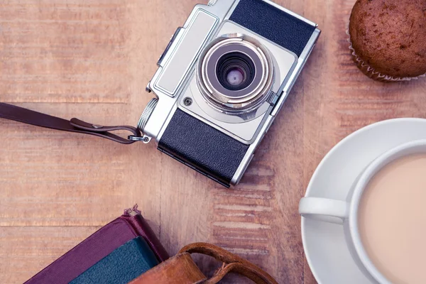Old camera with diaries and coffee — Stock Photo, Image