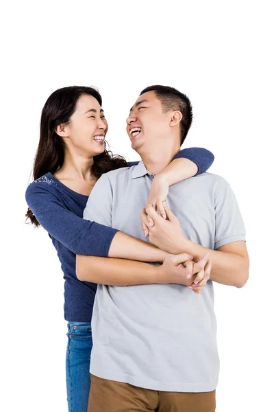 Cheerful woman embracing man — Stock Photo, Image