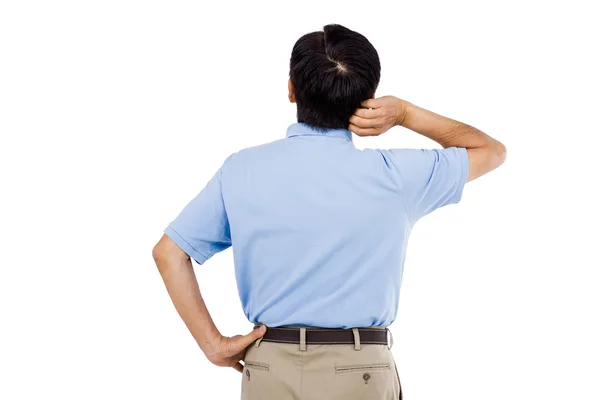 Rear view of man scratching head — Stock Photo, Image