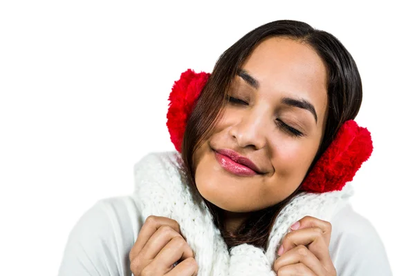 Woman wearing ear muff while eyes closed — Stock Photo, Image