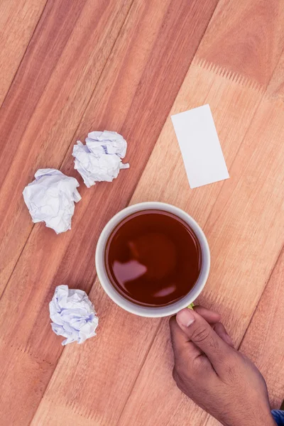 Cropped hand holding coffee cup — Stock Photo, Image