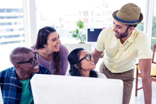 Colleagues looking at businessman — Stock Photo, Image