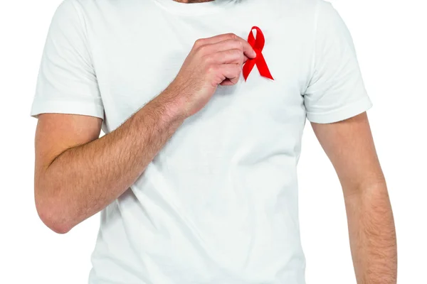 Midsection of man with red ribbon — Stock Photo, Image