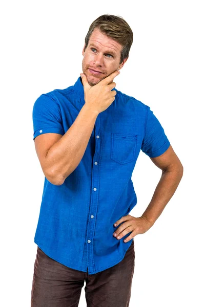 Hombre contemplado con la mano en la barbilla — Foto de Stock