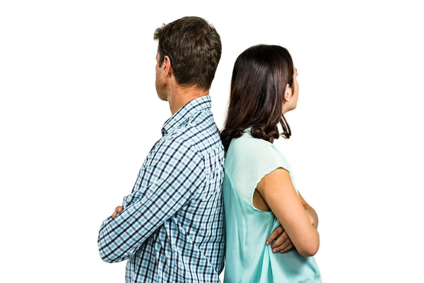 Couple s'ignorant l'un l'autre tout en se tenant dos à dos — Photo