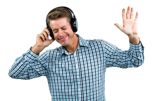 Retrato del hombre feliz usando auriculares — Foto de Stock