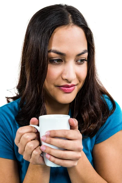Продумана жінка тримає чашку кави — стокове фото