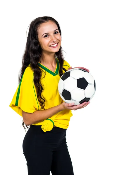 Attractive supporting woman holding football — Stock Photo, Image