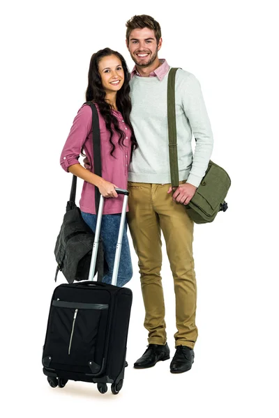 Retrato de pareja sonriente con equipaje —  Fotos de Stock