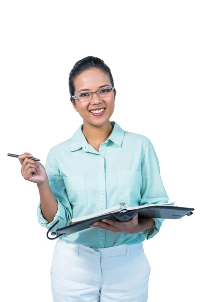 Mujer de negocios seria tomando notas —  Fotos de Stock