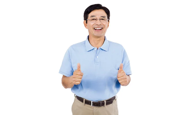 Homem alegre mostrando os polegares para cima — Fotografia de Stock