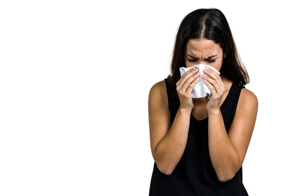 Unhappy woman blowing nose — Stock Photo, Image