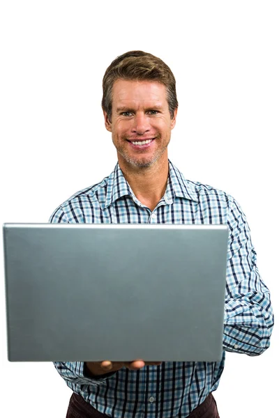 Portret van gelukkig man met laptop — Stockfoto