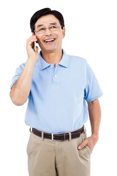 Happy man talking on mobile phone — Stock Photo, Image