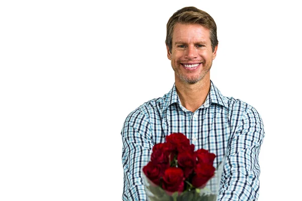 Glimlachende man met boeket rozen — Stockfoto