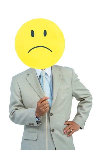 Geschäftsmann mit wütendem Smiley im Gesicht — Stockfoto